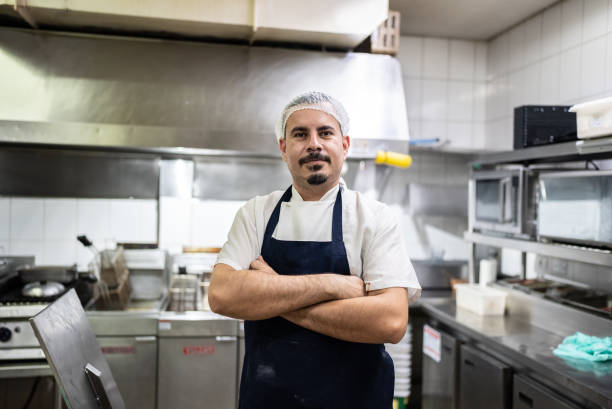 istock Portrait of a chef in a commercial kitchen 1413473595