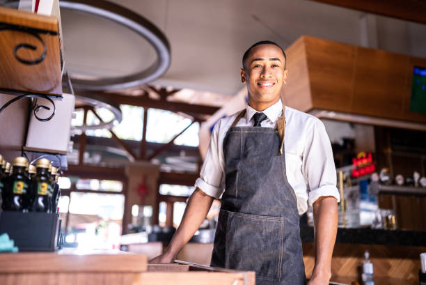 istock Portrait of a waiter at a restaurant 1413475277
