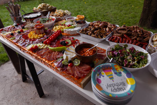 istock Birthday table full of food 1413478186