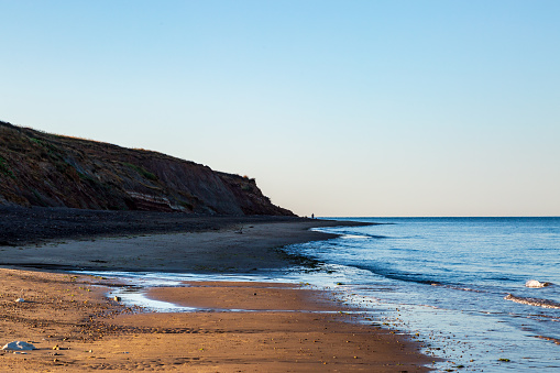 An early morning view along the beach, at Brook Chine on the Isle of Wight