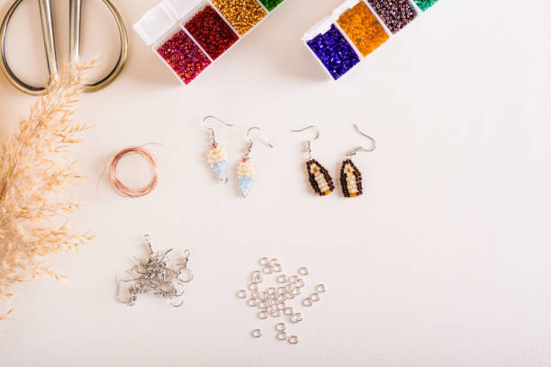 istock Working tools, beads and accessories for making jewelry. Needlework and handmade. Top view 1413481788