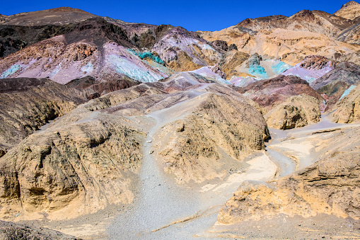 Artists Palette is an area in Death Valley National Park that has colorful rock formations created by a variety of minerals in the the rock.