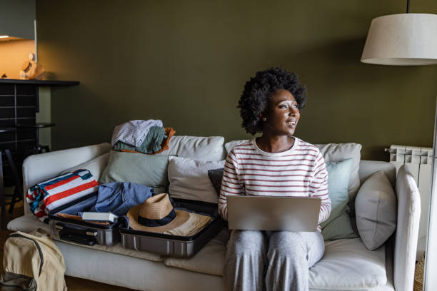 istock Travel planning. Booking a holiday online. 1413485246