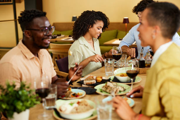 istock Happy friends have a dinner party at the restaurant. 1413488705