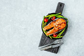 Grilled salmon steak and asparagus ready-to-eat