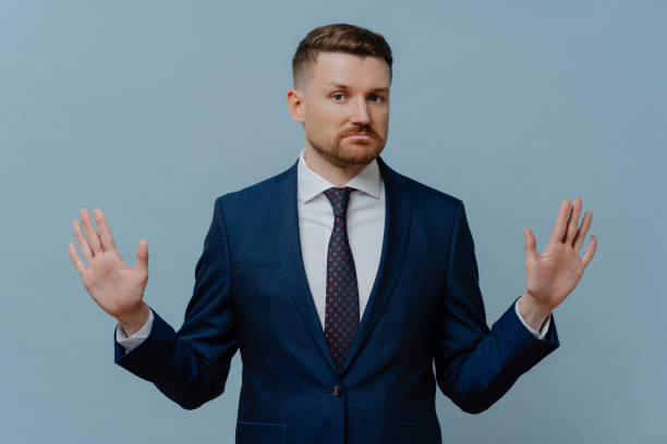 istock Confident businessman saying strict NO while rejecting offer 1413493822
