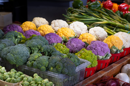 Fresh and colorful broccoli and cauliflower at a local food market