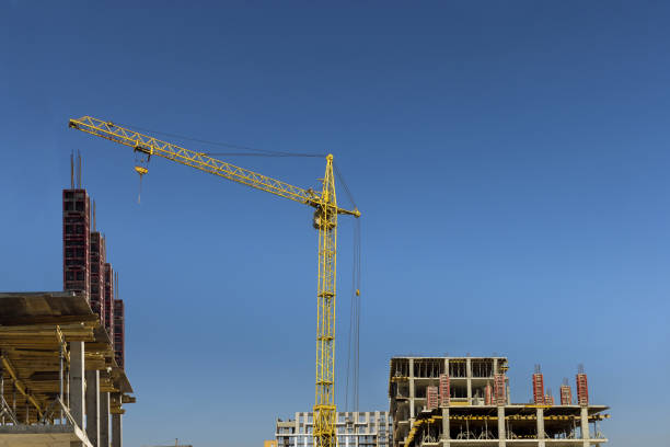 istock A multi-storey apartment building is being constructed using tower cranes that can reach heights as the work progresses along the building 1413496340