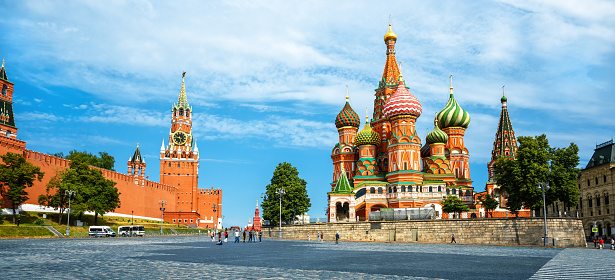 Moscow Kremlin and St Basil’s Cathedral, Russia. Panorama of famous tourist attractions of Moscow. Panoramic view of old city center in summer. Moscow landmarks, travel, tourism and sightseeing theme