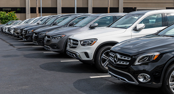 Pittsburgh, Pennsylvania, USA August 7. 2022 Mercedes Benz vehicles lined up at a dealership on a sunny summer day