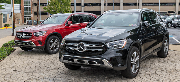 Pittsburgh, Pennsylvania, USA August 7. 2022 Two different Mercedes Benz vehicles together at a dealership on a sunny summer day