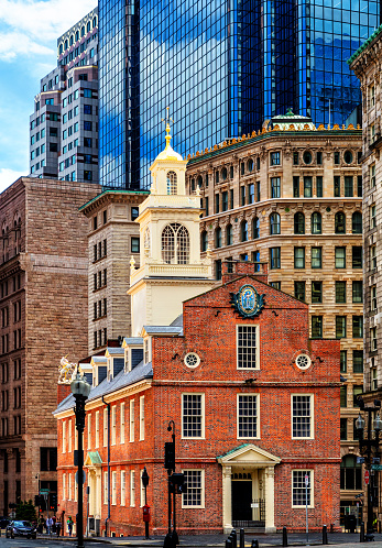 Boston, Massachusetts, USA - March 20, 2022: The Old State House is a historic building in Boston, Massachusetts. Built in 1713, it was the seat of the Massachusetts General Court until 1798. It is located at the intersection of Washington and State Streets, and is one of the oldest public buildings in the United States. It is one of the landmarks on Boston's Freedom Trail.