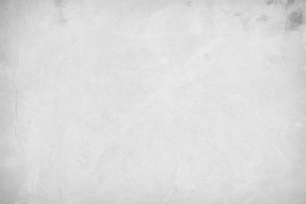 istock White concrete texture polished wall background. Grey retro plain color cement crack have sand and stone seamless of panoramic for decorative design element architecture urban smooth vintage surface. 1413507148