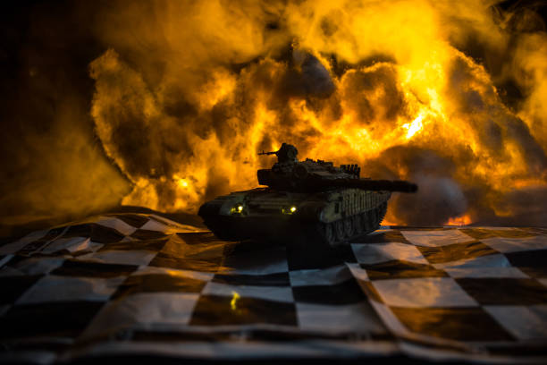 istock Armored Tank on Chess Board in Nighttime Warfare 1413509767