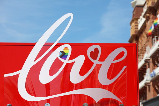 Brighton, England - August 6th 2022: Coca-Cola at the Brighton & Hove Pride. One of the UK's most significant pride events is celebrating its 30th anniversary. Brighton & Hove Pride is intended to celebrate, and promote respect for, diversity and inclusion within the local community and support local charities and causes through fundraising.