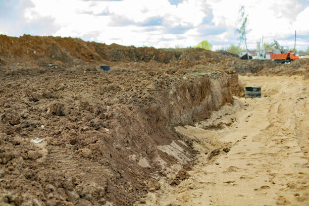 istock Excavated earth. Construction machinery dug up ground. 1413513347