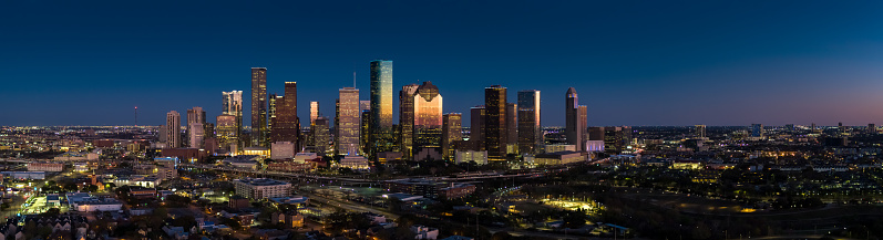 Panoramic drone shot of Houston, Texas at night, looking across Buffalo Bayou Park towards the downtown skyline. 

Authorization was obtained from the FAA for this operation in restricted airspace.