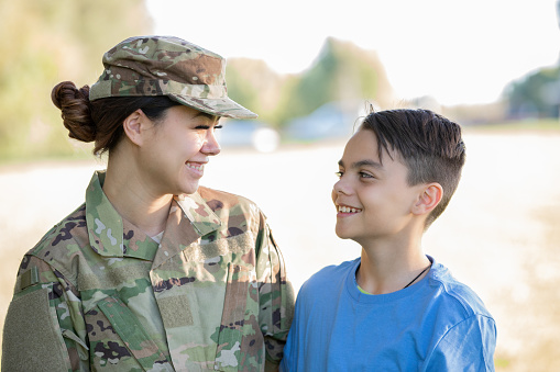 Portrait of Active Duty Serviceman with family member