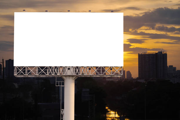 istock large Blank billboard ready for new advertisement with sunset 1413526023