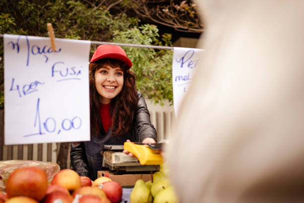 Fruit vendor and customer