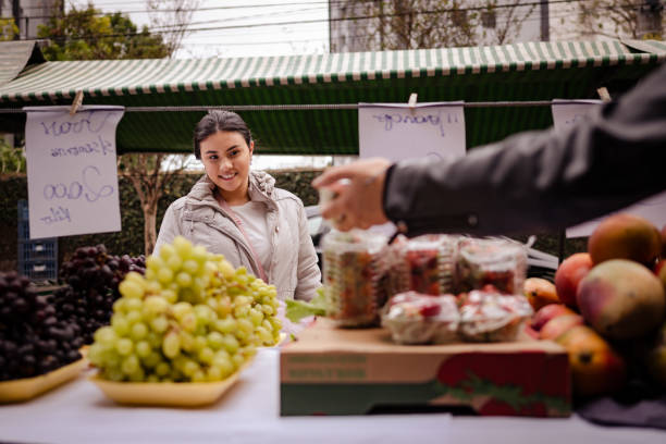 Fruit vendor and customer