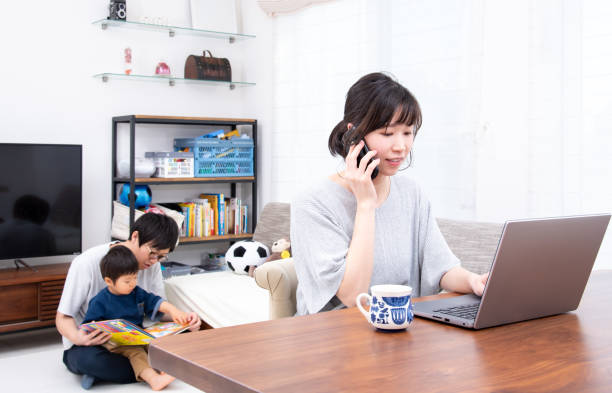 istock Mothers working from home and fathers playing with their children 1413537072