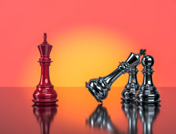 istock Red chess king standing position, defeating metal chess king supported by 2 pawns, 3d illustration 1413537397