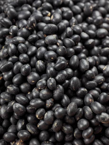 Organic Black Beans in a Bamboo Basket stock photo