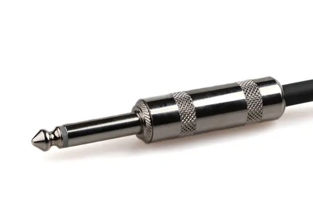 Photo of 6.35 mm TS connector is used to connect electric guitars
