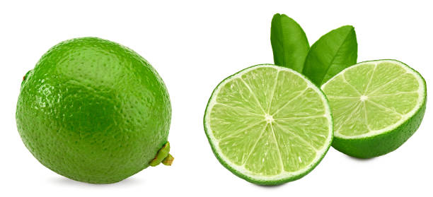 istock green lime with slice and green leaves isolated on white background. clipping path 1413548477