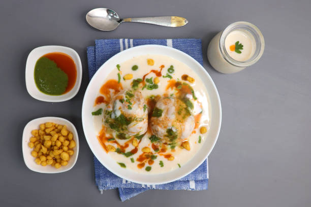 istock Dahi Bhalla or Dahi Vada is a type of chaat dish from India. It is prepared by soaking urad dal vadas in creamy yogurt with green and red chutney. Tricolor dish. Indian Tiranga Flag colors food. 1413549162