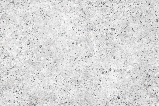 Granite texture, natural old rough gray concrete wall. Grey pattern of tile floor for design, grainy urban wall, spotted cement surface. Template with empty space. Abstract stone grunge background. stock photo