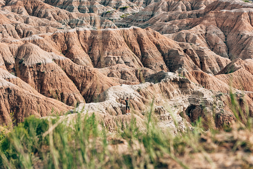 Badlands National Park is located in southwestern South Dakota, featuring nearly 400 square miles of sharply eroded buttes and pinnacles, and the largest undisturbed mixed grass prairie in the United States.