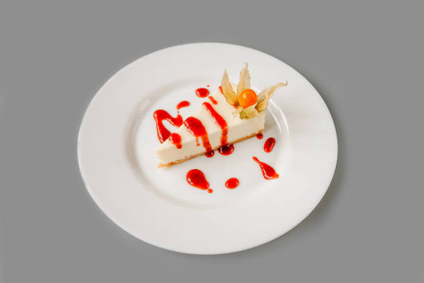 istock Homemade cheesecake with physalis and red jam. 1413559308
