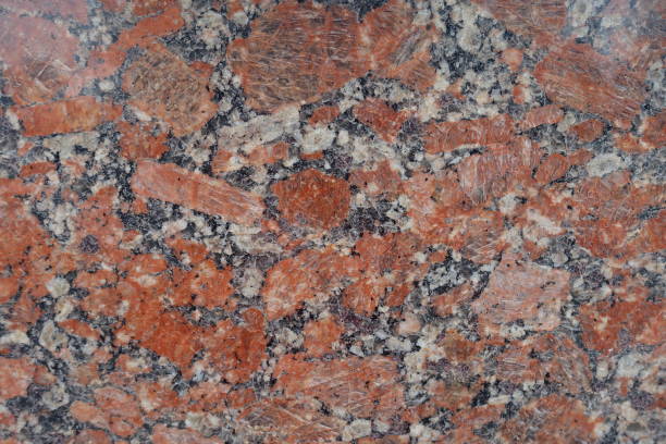 istock Texture of red, gray and white polished granite stone 1413559593