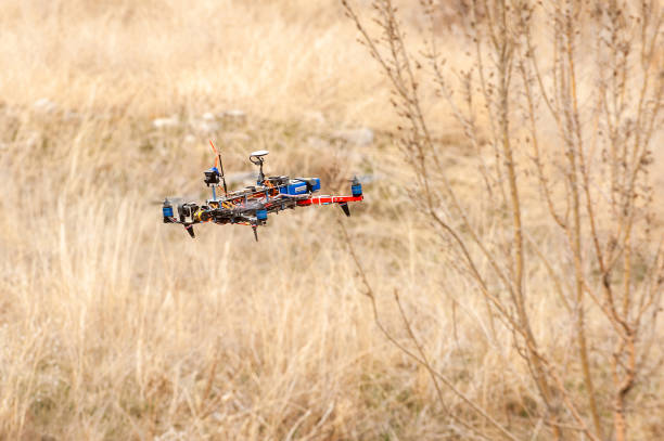 istock Shooting with a camera from close to the ground with drone technology 1413560390