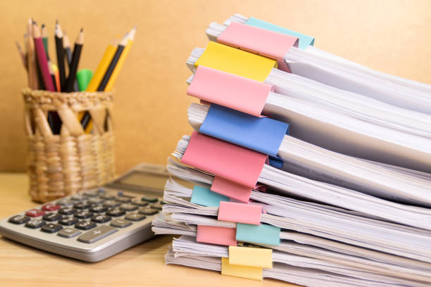 istock document paper of business report paper file on the table in a work office, concept document in work office 1413562222
