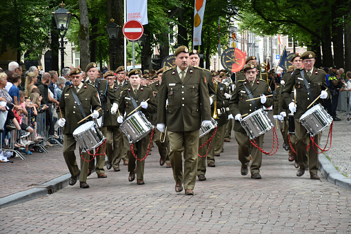 View Of Spectators And The Netherlands Armed Forces Orchestra Marching, Playing Music On The Street During Annual Veterans Day In The Hague The Netherlands Europe