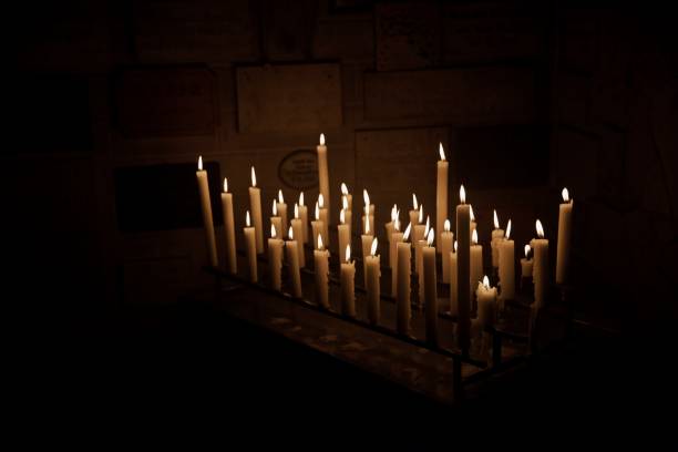 istock Close-Up Of Lit Candles In Temple 1413569751