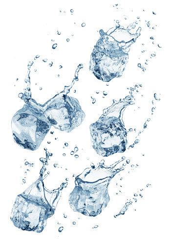 Ice cubes falling and splashing around water drops. File contains clipping paths.
