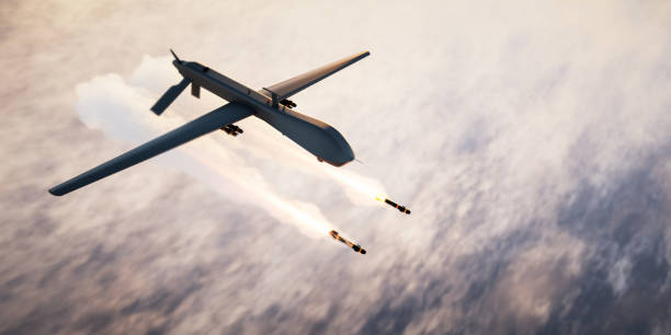istock Military combat drone UAV launching missiles 1413583976