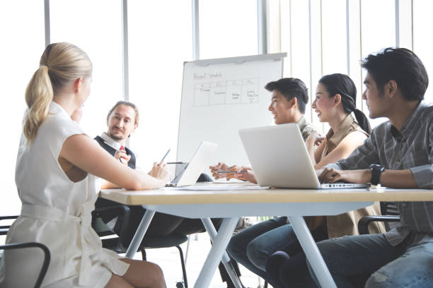 istock Business people discussing together in conference. 1413584075