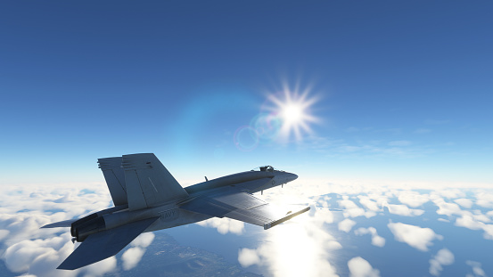 FA-18F Super Hornet aircraft flying over the sky and landscape green field