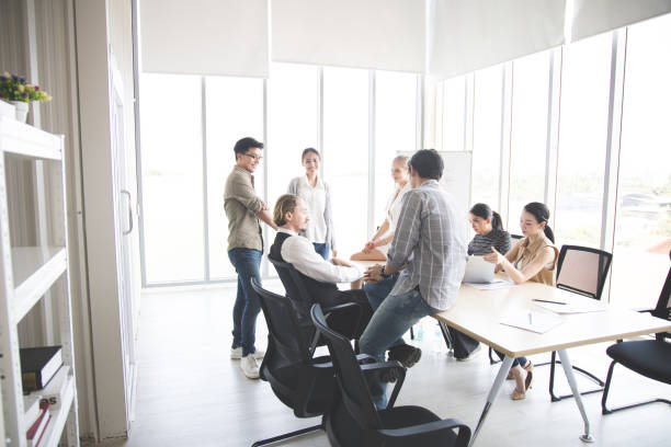 istock Brainstorming group of business people working. 1413584112