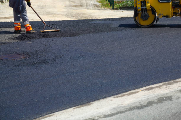 istock Laying new layer of asphalt 1413585015