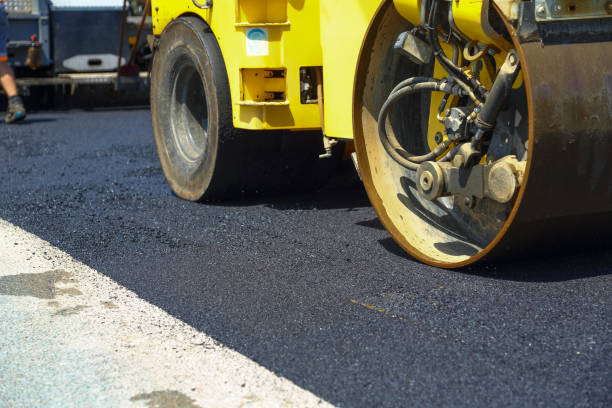 istock Resurfacing city road with asphalt paving machine 1413585056