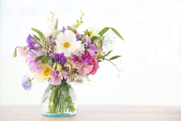 istock Mixed flowers bouquet on white 1413585235