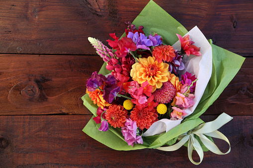 Mixed flowers bouquet flat lay