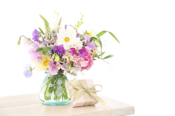 istock Mixed flowers bouquet on white 1413585433