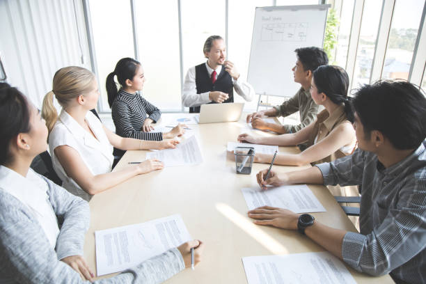 istock Business people discussing together in conference. 1413585485